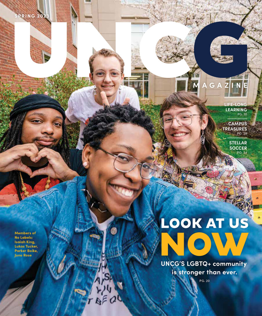 UNCG Magazine Spring 2023 cover, with 4 UNCG students taking a selfie.