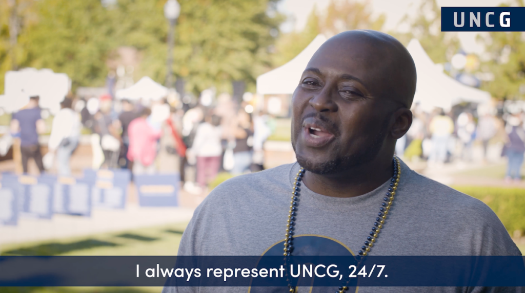UNCG alumnus talks on camera about Homecoming 2023.