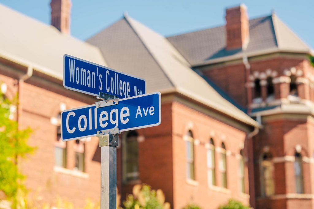 Street signs in front of Foust Building